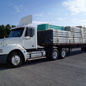 What are the logistics that brokers consider when they choose truck transportation?